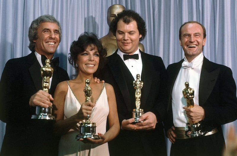 Bacharach, from left, appears with ex-wife Carole Bayer Sager, Christopher Cross and Peter Allen, winners of the Oscar for best original song Arthur's Theme at the 54th Annual Academy Awards in Los Angeles, 1982. AP