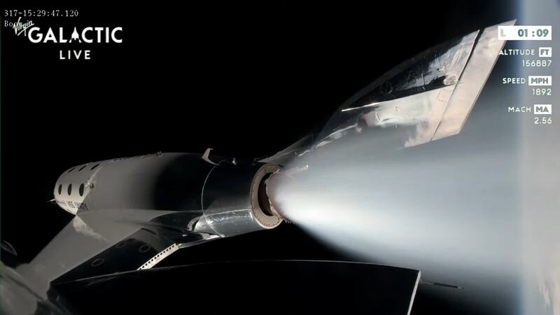 The engine on the VSS Unity spaceplane turns off as it reaches the edge of space.