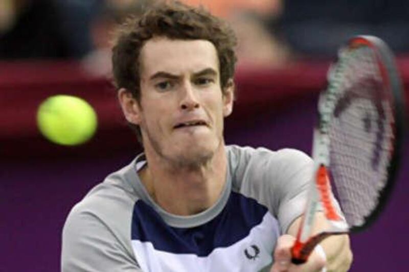 Britain's Andy Murray returns a service to Andrey Golubev during their final match at the St Petersburg Open.