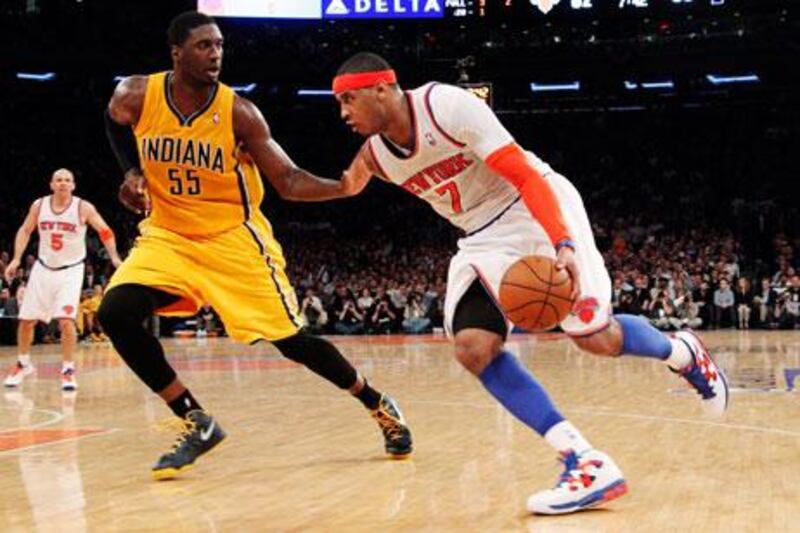 Carmelo Anthony, right, scored as many as 20 points in the second half against the Indiana Pacers. Mary Altaffer / AP Photo