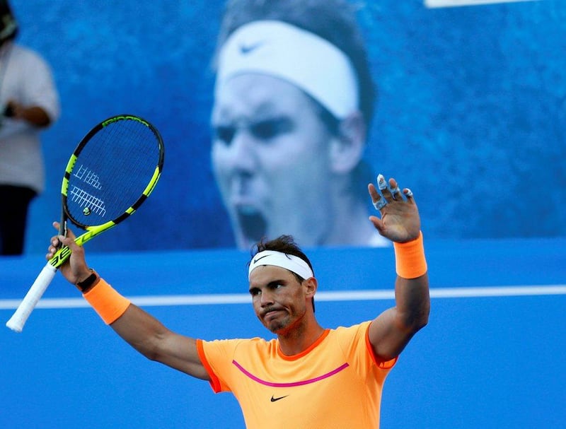 Rafael Nadal celebrates his victory over David Goffin for his fourth Mubadala World Tennis Championship in Abu Dhabi on December 31, 2016. Ahmed Jadallah / Reuters