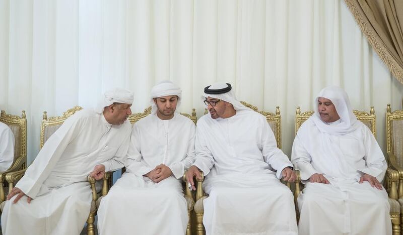 Sheikh Mohammed bin Zayed, Crown Prince of Abu Dhabi and Deputy Supreme Commander of the Armed Forces, second right, offers condolences to the family of martyr Mohammed Al Humoodi who died while serving with the Armed Forces in ‘Operation Restoring Hope’. Mohammed Al Hammadi / Crown Prince Court - Abu Dhabi