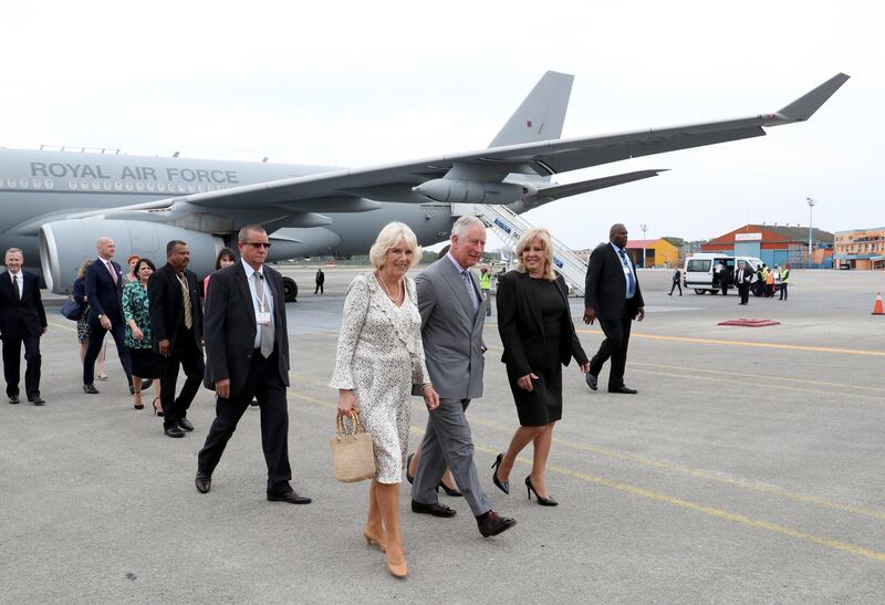 Prince Charles, Prince of Wales, and Camilla, Duchess of Cornwall, are greeted by Ana Teresita Gonzalez, Cuba's deputy minister of foreign affairs, in Cuba. Getty
