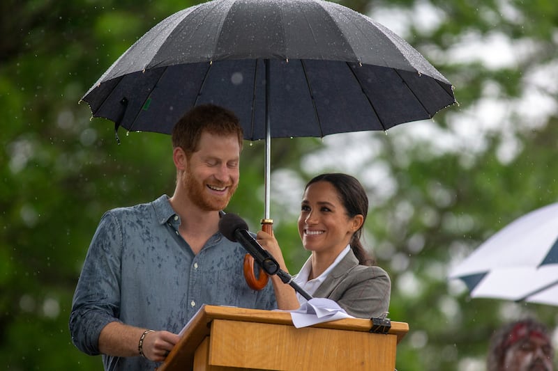 Prince Harry and Meghan address the public during a Community Event at Victoria Park in October 2018 in Dubbo, Australia. Getty