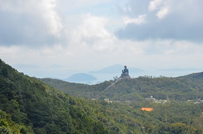 Hong Kong's Lantau Island is home to the Tian Tan Buddha, a giant sculpture that towers over the tourists who flock to see it. Photo: Nadine Marfurt / Unsplash