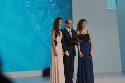 The sisters on stage with Egyptian President Abdel Fattah El Sisi in Sharm El Sheikh. Photo: The Ayoub Sisters