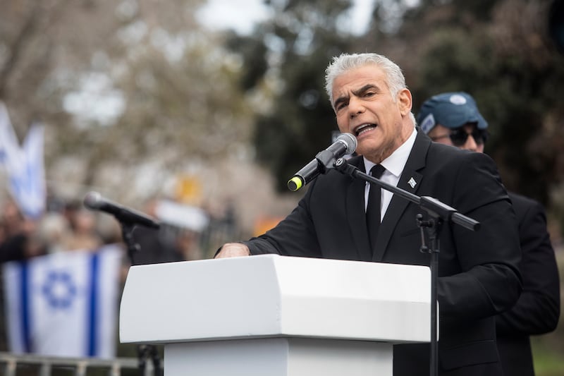 Former Israeli prime minister and current opposition leader Yair Lapid addresses the demonstrators. Getty Images