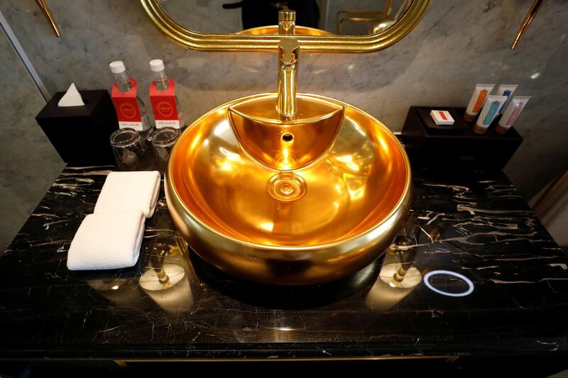 A gold-plated bathroom sink is seen at Dolce Hanoi Golden Lake luxury hotel. Reuters