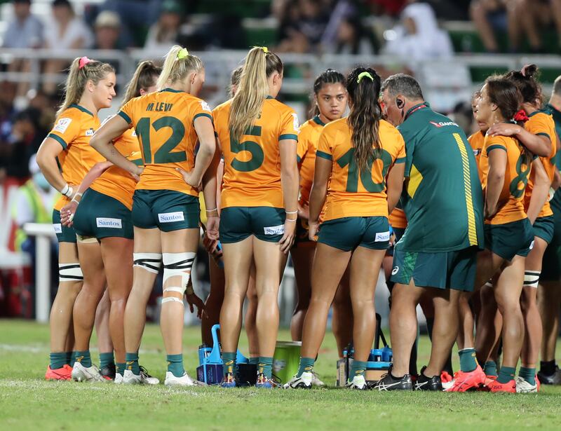 Australia receive instructions at half time during the Dubai Sevens final.