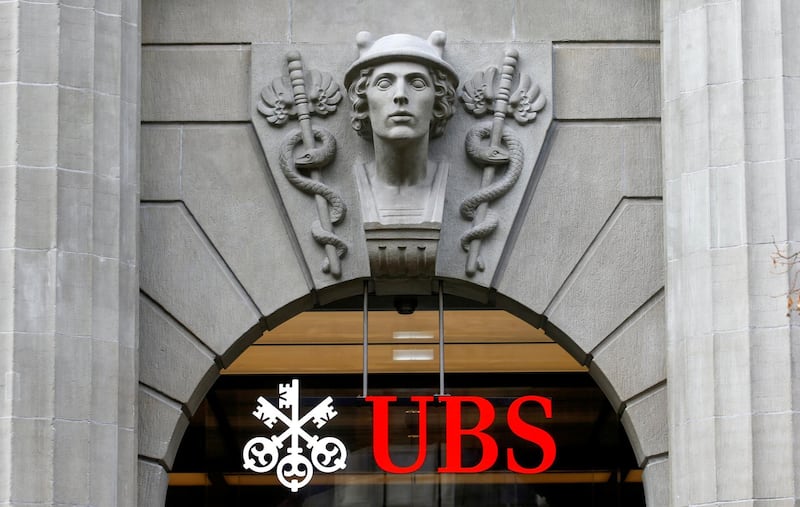 FILE PHOTO: The logo of Swiss bank UBS is seen at its headquarters, as the spread of the coronavirus disease (COVID-19) continues, in Zurich, Switzerland February 17, 2021. REUTERS/Arnd Wiegmann/File Photo