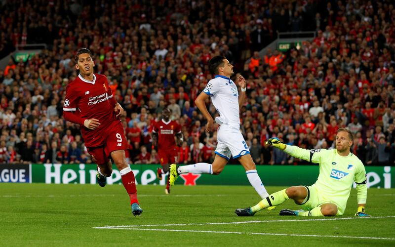 Soccer Football - Champions League - Playoffs - Liverpool vs TSG 1899 Hoffenheim - Liverpool, Britain - August 23, 2017   Liverpool's Roberto Firmino celebrates scoring their fourth goal as Hoffenheim’s Oliver Baumann looks dejected    REUTERS/Phil Noble