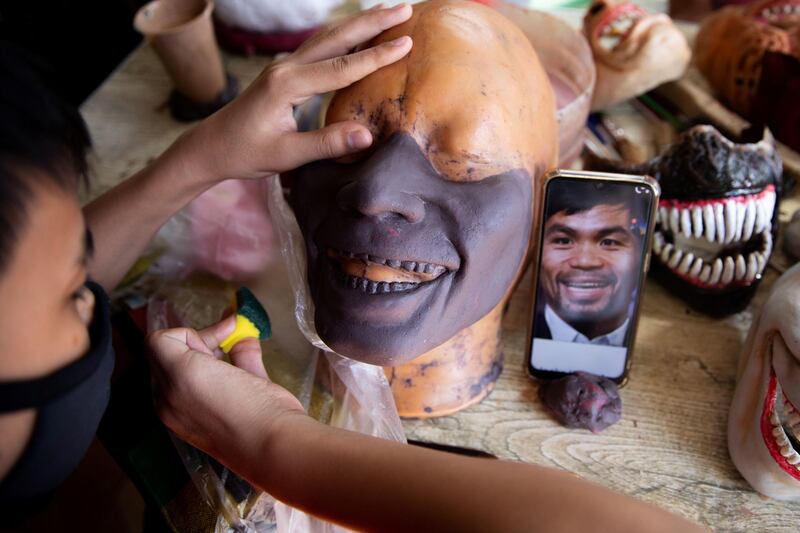 Rainier Abelardo has sold dozens of the moulded masks, from monsters and zombies to the devil and the Joker
