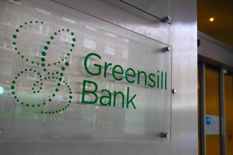 (FILES) This file photo taken on March 15, 2021 shows the logo of the Greensill bank at its headquarters in Bremen, northern Germany. Insolvency proceedings have been launched for Germany's Greensill Bank a week after the collapse of its British owner, financial services firm Greensill, a court said on March 16, 2021. The proceedings began for Bremen-based Greensill Bank "at the request of (financial regulator) Bafin", the court in Bremen said in a statement. Bafin had ordered a freeze on the bank's activities in early March because of a risk that its debt would become unmanageable.
 / AFP / Patrik Stollarz
