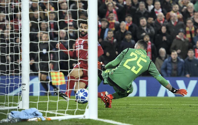 LIVERPOOL, ENGLAND - DECEMBER 11: (THE SUN OUT, THE SUN ON SUNDAY OUT )  Mohamed Salah  of Liverpool scores the opening goal during the UEFA Champions League Group C match between Liverpool and SSC Napoli at Anfield on December 11, 2018 in Liverpool, United Kingdom. (Photo by Nick Taylor/Liverpool FC/Liverpool FC via Getty Images)