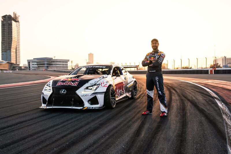 Daham stands beside his new ride.