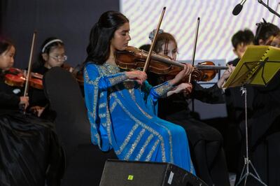 The Emirates Youth Symphony Orchestra perform on the opening evening of Al Marmoom: Film in the Desert Festival. Antonie Robertson / The National