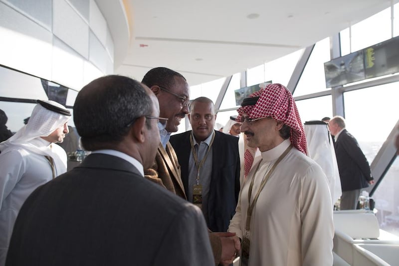 Prince Alwaleed bin Talal bin Abdulaziz Al Saud of Saudi Arabia, speaks to Hailemariam Desalegn, former prime minister of Ethiopia, during the 2015 Formula One race in Abu Dhabi. Ryan Carter / Crown Prince Court - Abu Dhabi