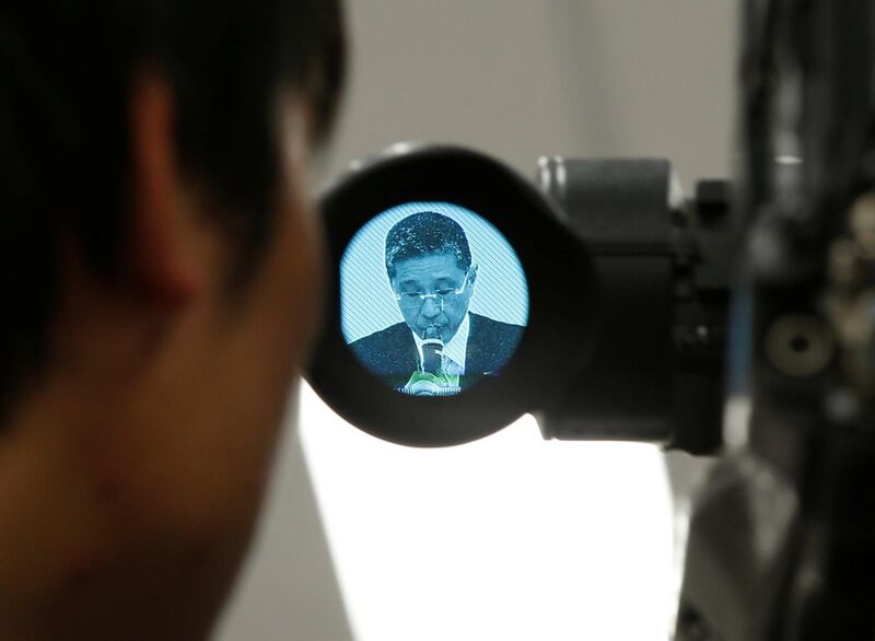 Nissan chief executive Hiroto Saikawa is seen through a viewfinder of a television camera in Yokohama,  Japan. Toru Hanai / Reuters
