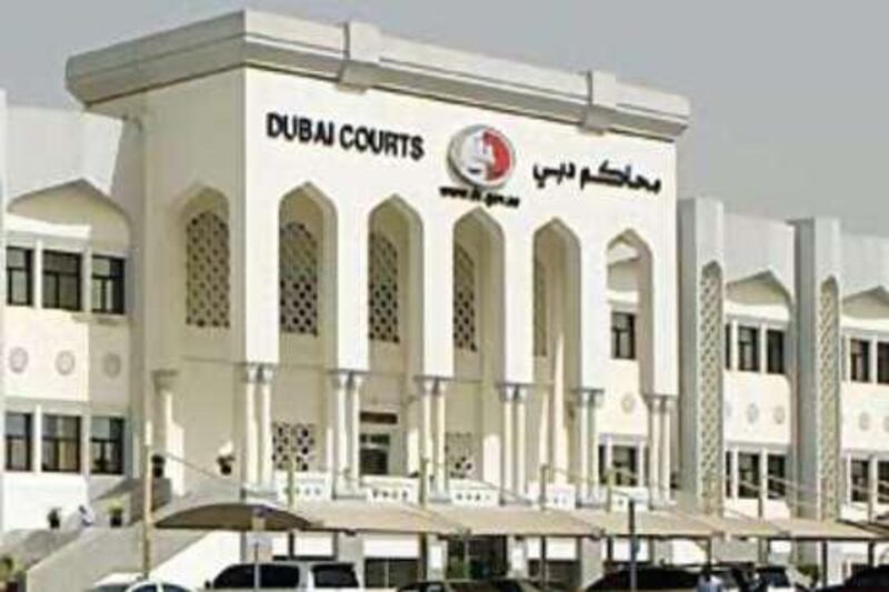 A British man appeared in court accused of assaulting two police officers in Dubai.    