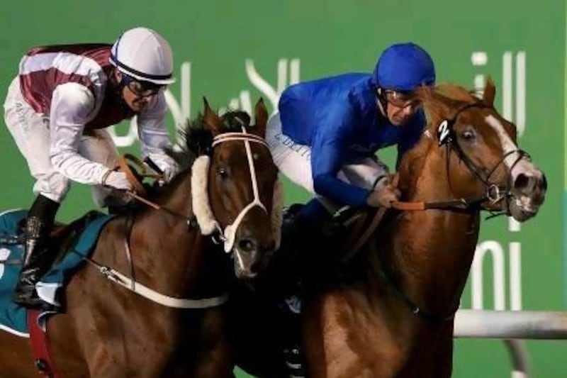 Frankie Dettori, right, on his way to success on Tahaamah.
