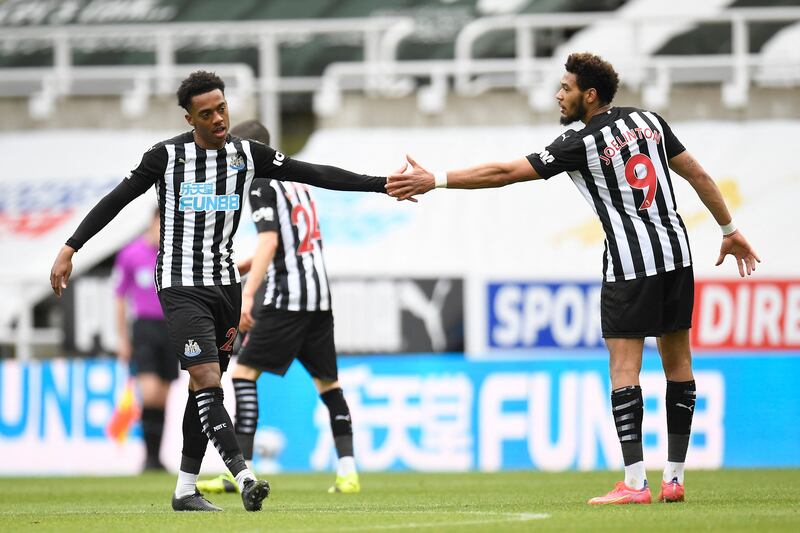 Newcastle United's English midfielder Joe Willock (L) celebrates scoring his team's second goal with Newcastle United's Brazilian striker Joelinton (R) during the English Premier League football match between Newcastle United and Tottenham Hotspur at St James' Park in Newcastle-upon-Tyne, north east England on April 4, 2021. RESTRICTED TO EDITORIAL USE. No use with unauthorized audio, video, data, fixture lists, club/league logos or 'live' services. Online in-match use limited to 120 images. An additional 40 images may be used in extra time. No video emulation. Social media in-match use limited to 120 images. An additional 40 images may be used in extra time. No use in betting publications, games or single club/league/player publications.
 / AFP / POOL / PETER POWELL / RESTRICTED TO EDITORIAL USE. No use with unauthorized audio, video, data, fixture lists, club/league logos or 'live' services. Online in-match use limited to 120 images. An additional 40 images may be used in extra time. No video emulation. Social media in-match use limited to 120 images. An additional 40 images may be used in extra time. No use in betting publications, games or single club/league/player publications.
