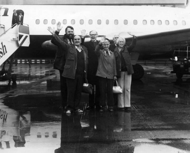 Mr Waite with British church workers, who were held hostage in Lebanon, at Heathrow airport in 1981. Getty