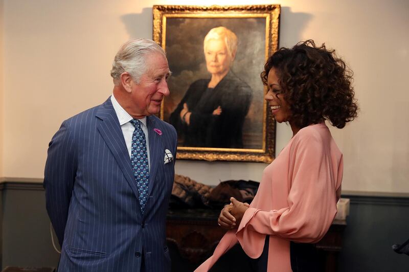 And he also had a chat with actor Naomie Harris in front of a portrait of the late M, played by Dame Judi Dench. Harris plays Eve Moneypenny in the Bond films. Reuters