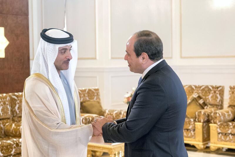 ABU DHABI, UNITED ARAB EMIRATES - February 06, 2018: HH Sheikh Hazza bin Zayed Al Nahyan, Vice Chairman of the Abu Dhabi Executive Council (L), greets HE Abdel Fattah El Sisi, President of Egypt (R), during a reception at the Presidential Airport.

( Rashed Al Mansoori / Crown Prince Court - Abu Dhabi )
---