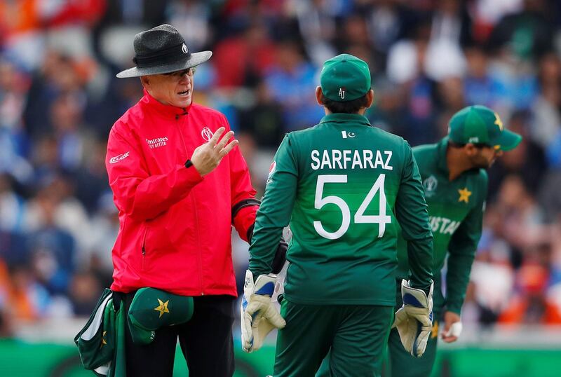 The Umpire talks to Pakistan's Sarfaraz Ahmed. Reuters