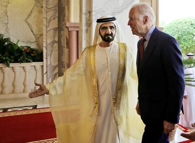 Sheikh Mohammed bin Rashid, Vice President and Ruler of Dubai, welcoming Joe Biden to the UAE in 2016 when the current US President was vice president. Mr Biden will visit the Middle East next week. AP