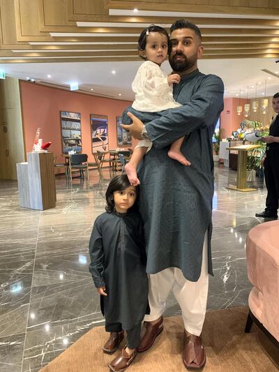 Usman Sajid with his children. The UAE resident was the primary caretaker for his children after they were born. Supplied