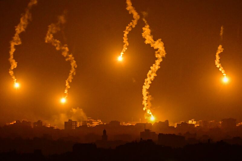 Flares are dropped by Israeli forces above Gaza, as seen from Sderot, near the border with the Palestinian enclave. AFP