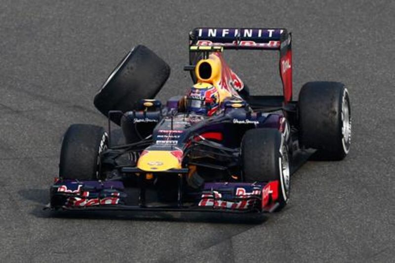 Red Bull's Mark Webber is forced to retire after losing his rear wheel following a collision in Shanghai.