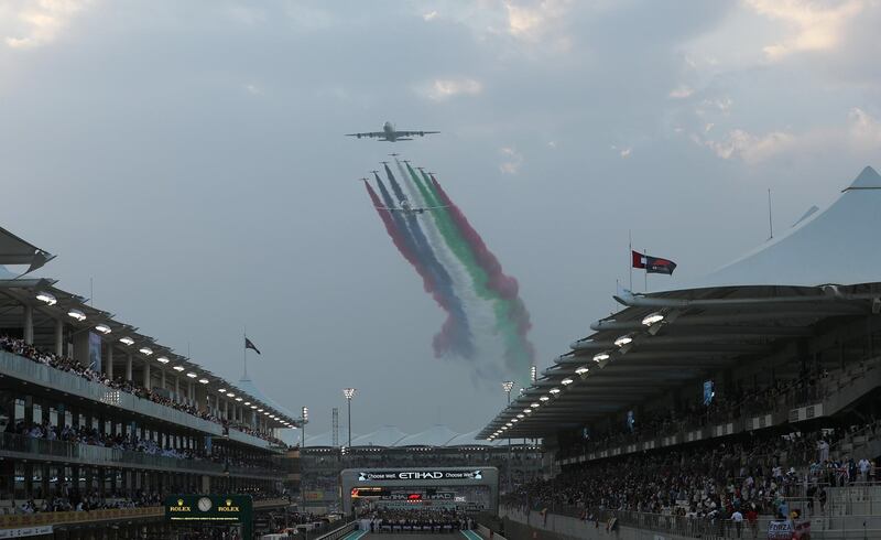 Planes fly over the circuit before the race. Reuters