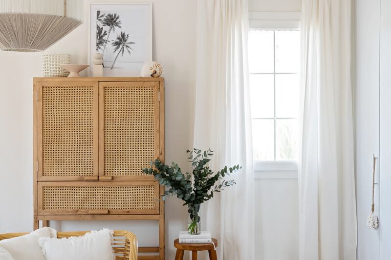 Natural light and billowy curtains add to a sense of breeziness. Photo: Kuky Designs