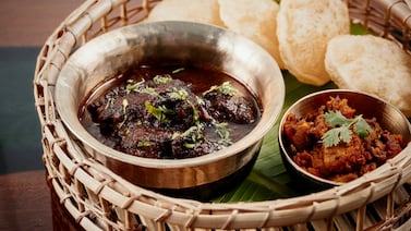 Poda mangsho is a Bengali mutton curry served with pumpkin stew. Photo: Atrangi by Ritu Dalmia