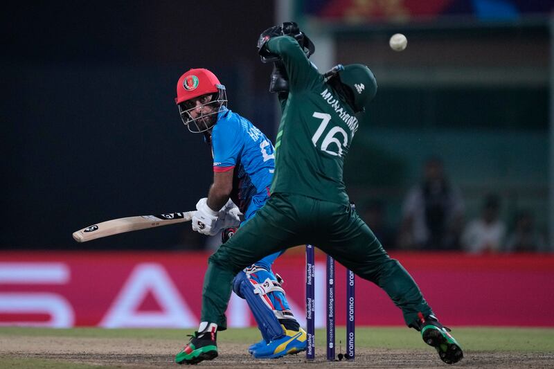Afghanistan's captain Hashimatullah Shahidi watches the ball after playing a shot. AP 