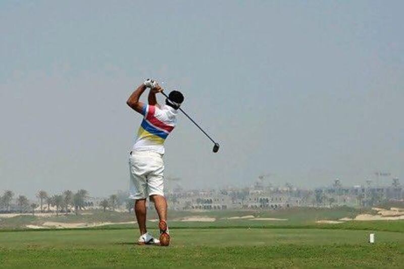 Teeing off at 11th hole of the Saadiyat Gof Club in Abu Dhabi. Ravindranath K / The National
