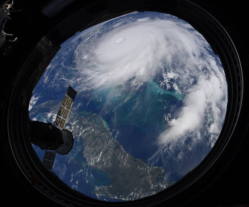 14.	An image of the Hurricane Dorian taken by US astronaut Christina Koch in 2019. The natural disaster struck the Bahamas and killed more than 70 people. Photo: Nasa Earth Observatory