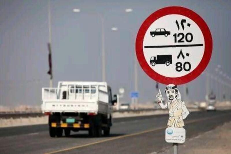 A traffic sign in Mesaid, Qatar. Nadine Rupp / Getty Images
