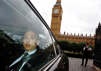 FILE PHOTO: Mark Sedwill, the top civil servant at Britain's Home Office leaves the Houses of Parliament after giving evidence at a Commons Home Affairs Select Committee hearing in London July 8, 2014.  REUTERS/Luke MacGregor/File Photo