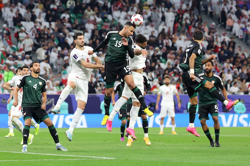 Khaled Ibrahim of the UAE wins a header. Getty Images