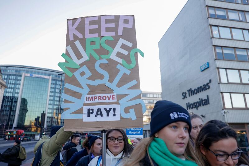 Striking nurses outside St. Thomas' Hospital, London. Bloomberg