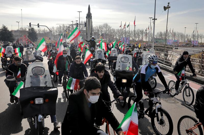 Iranians attend a rally marking the 42nd anniversary of the Islamic Revolution. AP