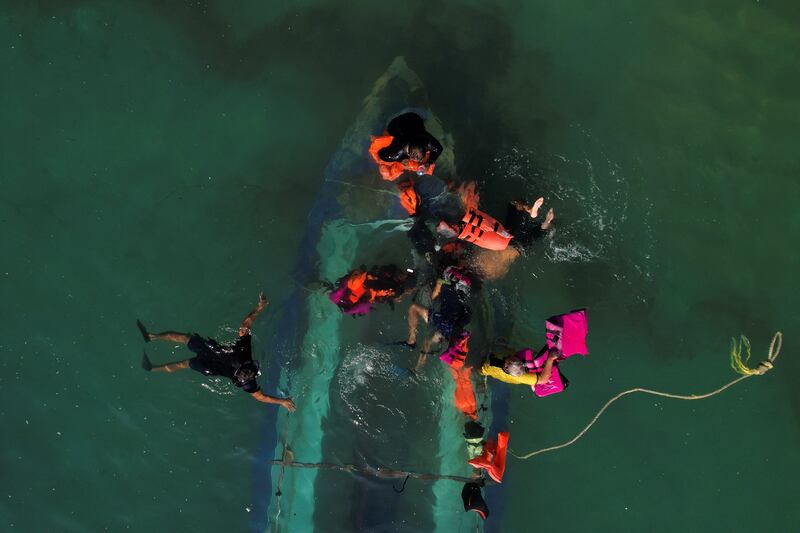 Divers search for sunken boats in the aftermath of Hurricane Otis, in Acapulco, Mexico. Reuters