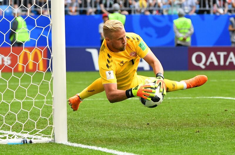 Denmark's Kasper Schmeichel makes a save. Dylan Martinez / Reuters