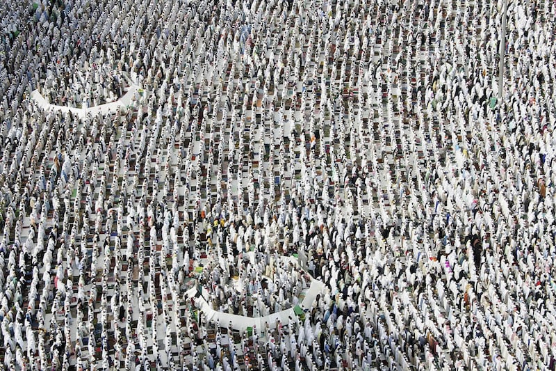 Pilgrims gather at the Kabba to pray in 2005.