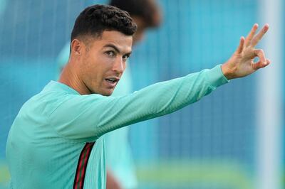 epa09293779 Portugal's Cristiano Ronaldo during a training session at the Illovszky Rudolf Stadium, Budapest, Hungary, 22 June 2021. Portugal will face France in their UEFA EURO 2020 group F round soccer match on 23 June 2021.  EPA/HUGO DELGADO