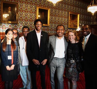 Khadija Saye, second left; Okwui Enwezor, middle right; Nicola Green, second right; and Labour MP David Lammy MP at the House of Commons, London, in 2015. Photo: The Estate of Khadija Saye / In memory: Khadija Saye Arts at IntoUniversity