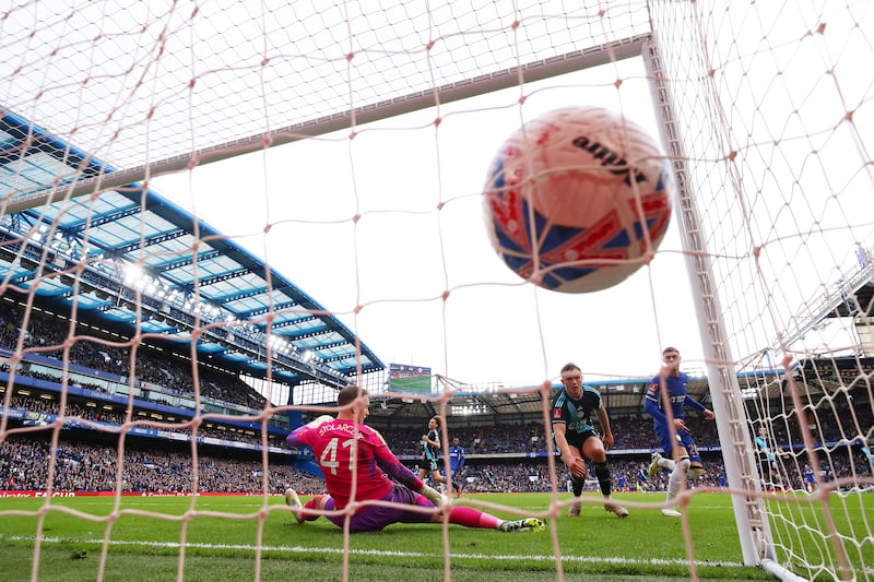 Chelsea's Cole Palmer finishes past Leicester goalkeeper Jakub Stolarczyk. Getty Images
